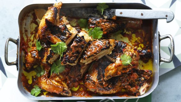Keep a cutting board and knife handy to portion larger dishes such as Adam Liaw's butterflied peri-peri barbecue chicken (