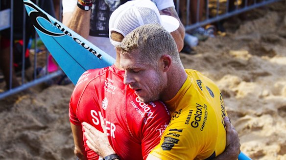 Emotional: Kelly Slater and Mick Fanning at the Pipe Masters.