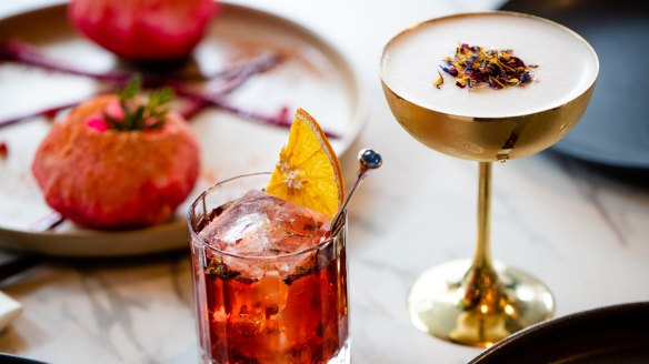 Rose negroni (left) and Marigold Sour cocktail.