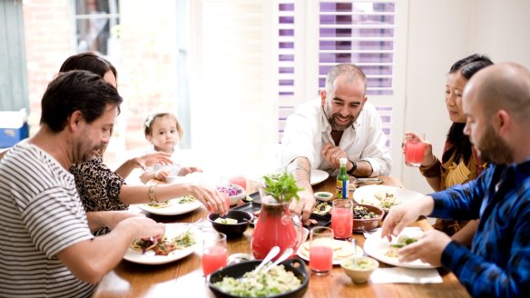 How do families turn the dining room into a warmer family-friendly space?