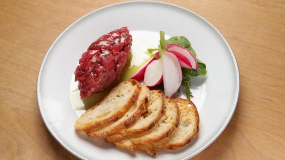 Sirloin crudo with radishes and toast.