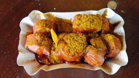 To outsiders, Berlin's addiction to currywurst seems inexplicable but visitors have to try at least once.