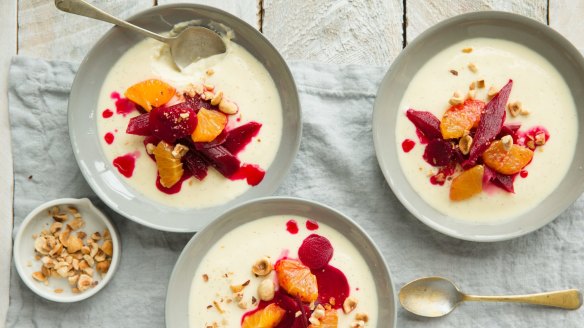 A dessert to celebrate spring, this lemon panna cotta recipe is served with  poached rhubarb, beetroot and hazelnuts.