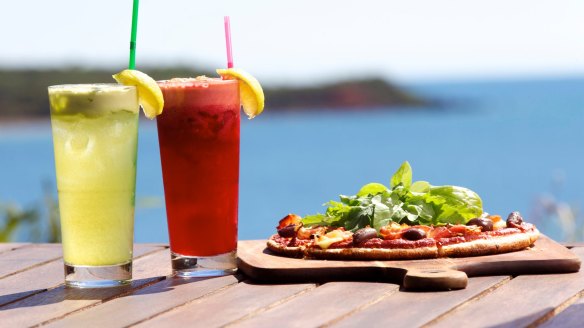 Fresh juices and pizza at Whale Song Cafe.