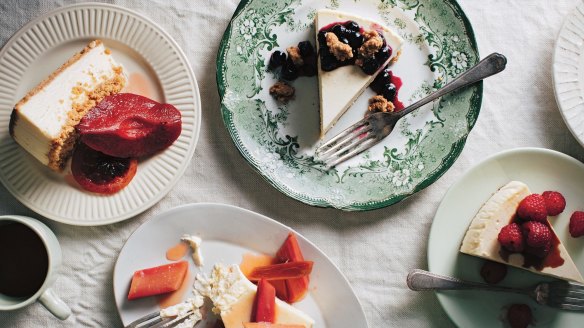 Choose your own cheesecake adventure: Beatrix's cheesecake  pictured with various toppings including (clockwise from centre) burst blueberry compote with butter oat streusel; raspberries; roasted rhubarb with ginger; and double-crust with slow-cooked quinces.