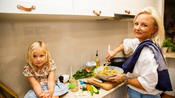 Lucy Tweed with daughter Winter at home.