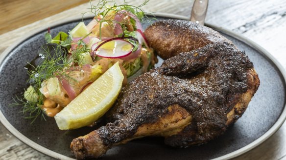 Barbecue chicken with cob salad and zhoug.