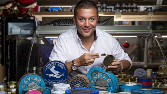 Gourmet food importer and owner of Gourmet Life, Josh Rea, with his collection of caviar. 