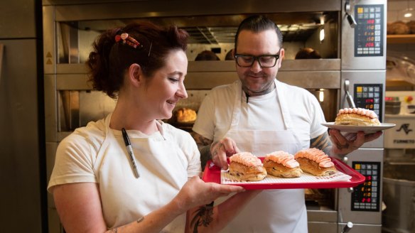 Alyce Bennett and Ben Milgate at Humble Bakery in Surry Hills with their pink finger buns.