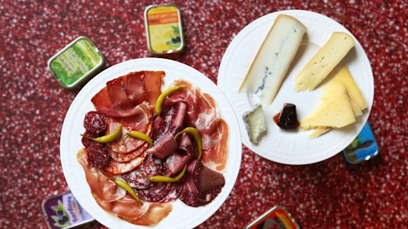 It's impossible to go wrong with the charcuterie plate (left), while a spoonful of floral jam brings things together on the cheese platter.
