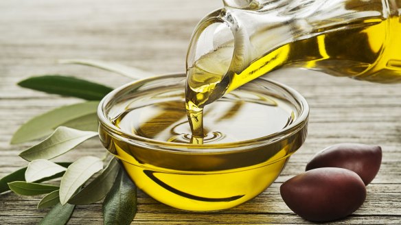 Extra virgin olive oils have healthy antioxidants such as biphenols, that catch on the back of the throat. 