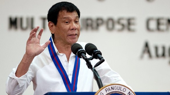 Philippines President Rodrigo Duterte  speaks at police headquarters in Manila on August 17.