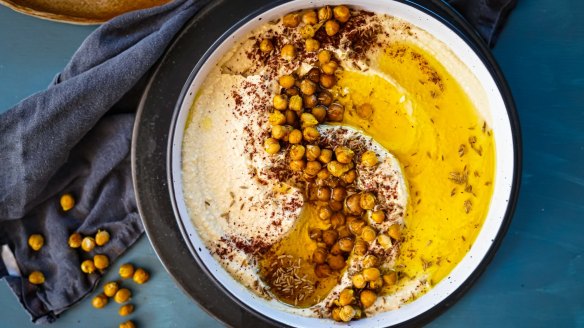 Swipe some flatbread through this preserved lemon hummus with crispy spicy chickpeas.