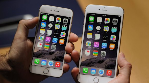 Sleek: the Apple iPhone 6, left, and iPhone 6 Plus.