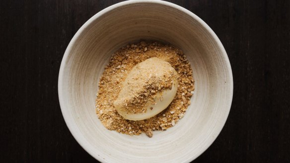 Jerusalem artichoke ice-cream on a rubble of roasted white chocolate and matzo praline.