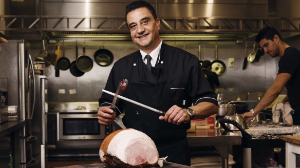 Pino Tomini Foresti of Pino's Dolce Vita Fine Foods with one of his sought-after hams in Kogarah.