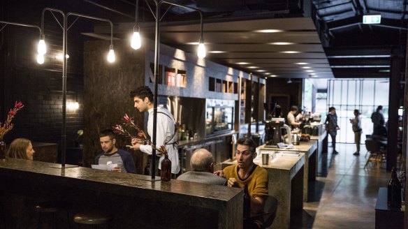 Melbourne black: inside the dark warehouse cafe.