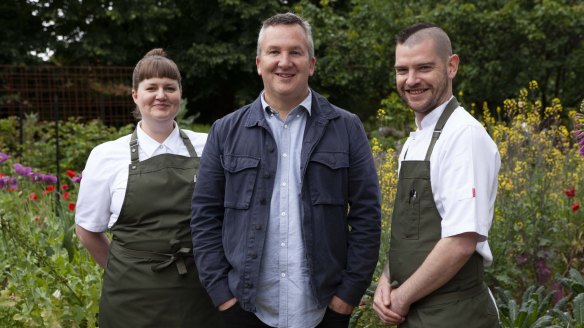 From left: Heide Kitchen sous chef Jillian McInnes, Mulberry Group founder Nathan Toleman and chef Bob Piechniczek in the kitchen garden.