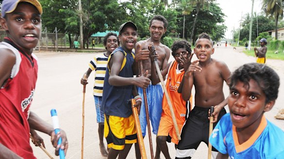 Kids play in the main street of Aurukun.