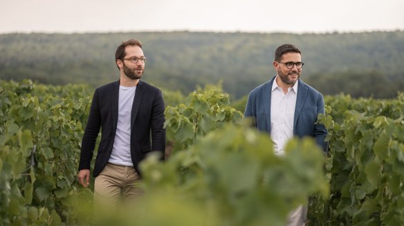 Piper-Heidsieck chief winemaker Emilien Boutillat (left) in the Reims vineyard with CEO Benoit Collard.