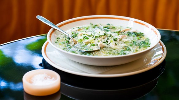 Chicken soup with peas and rice.
