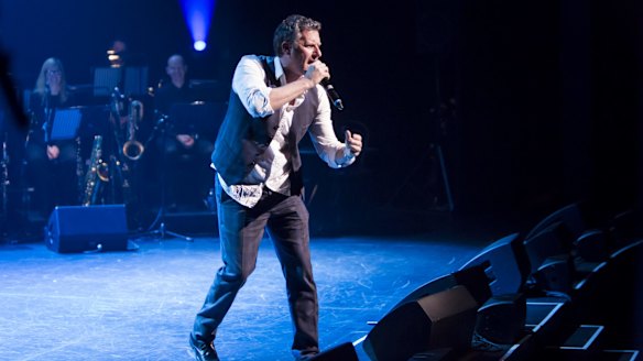 Adam Hills finds healing power of laughter after father's death