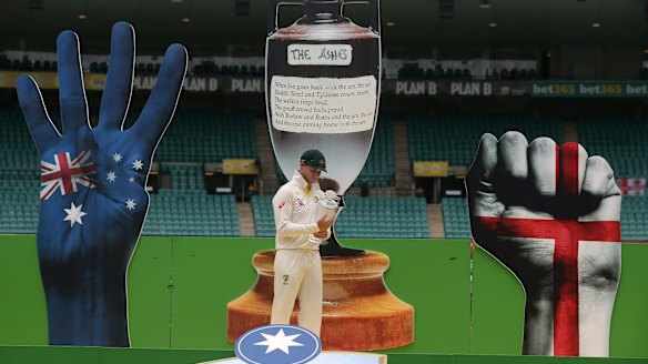 Gotta hand it to 'em: Australia's Steve Smith holds the Ashes trophy after his side's win over England at the SCG.