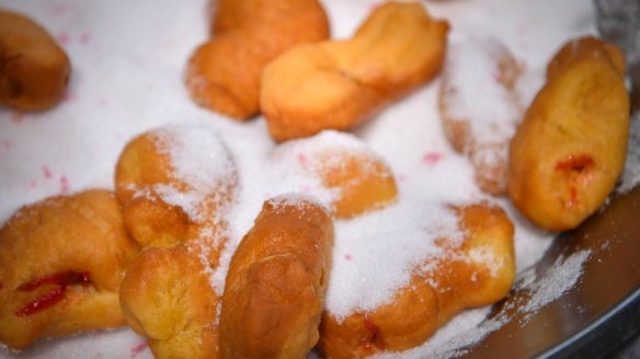 Doughnuts in sugar at American Doughnut Kitchen.