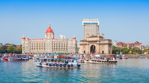 The Taj Mahal Hotel and Gateway of India seen from Mumbai Harbour. 