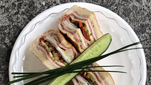 Dame's club-style muffaletta with celery salt cucumber. 