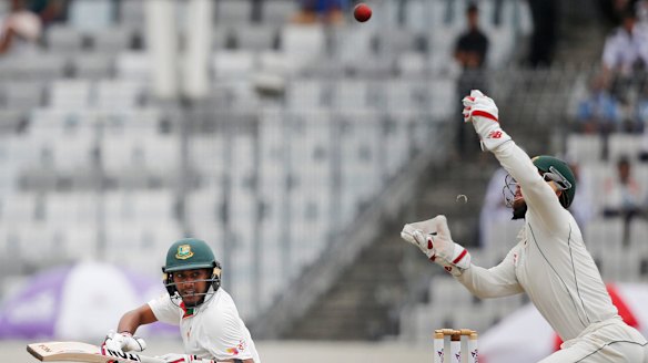 Wade tries to take a catch during the first Test.