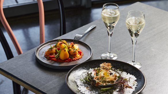 Repeat Offender's  maritime-themed menu includes lobster and potatoes with romesco (left) and scallop ceviche.