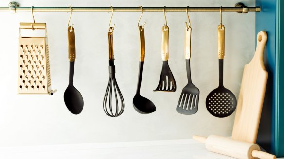Hang utensils (or pots) on a rack, and lean chopping boards against splashbacks.