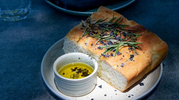House-made focaccia flecked with smoked thyme and black salt.
