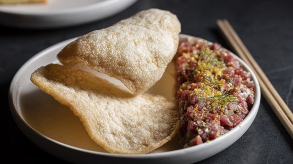 Korean-style steak tartare with prawn crackers.