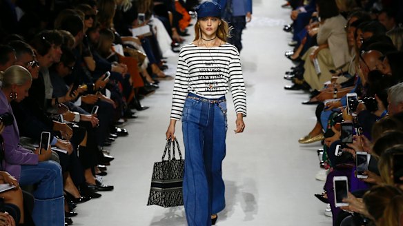 A model wears the t-shirt at the Dior show during Paris Fashion Week. 