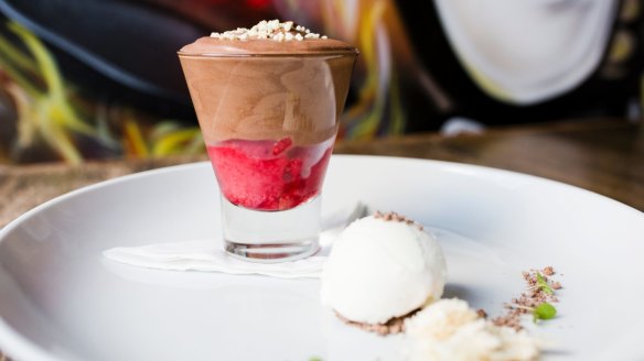 The chocolate mousse is sweet and light with a layer of raspberry at the base.