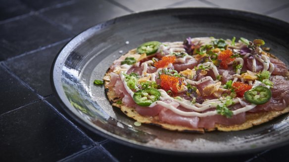 Ruby red tuna pizza (tuna with anchovy mayo, garlic, wakame oil, shisho and tomato salad on cornbread) at Ren Ishii.