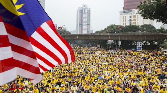 Protesters call for Malaysian Prime Minister Najib Razak to quit over corruption allegations in 2015.