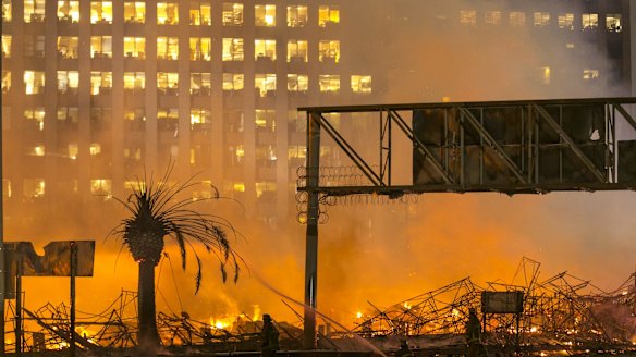 Massive fire closes freeways in downtown Los Angeles
