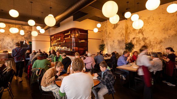 Moonhouse's downstairs dining room is a bustling bistro-style setting.