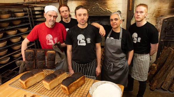 Keeping the oven fire burning: The RedBeard team (from left), baker David Haines, apprentice Fin Ward, baker Michael James, and cooks Angela Nicolettou and Lachlan McFarlane.
