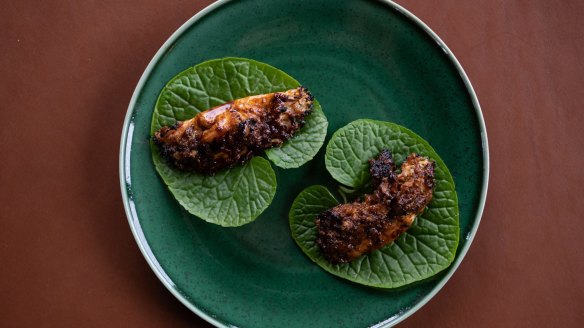 Grilled snowflake mushroom and wasabi leaf.