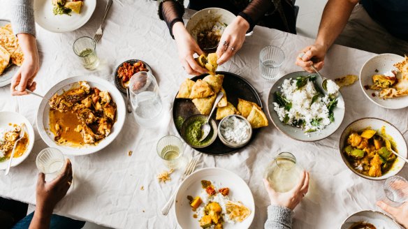 Participants share a meal at the end of a Free to Feed cooking class.