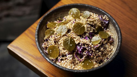 Mother-in-law salad with cabbage, maple mayo, pickled caper leaves and sesame seeds.