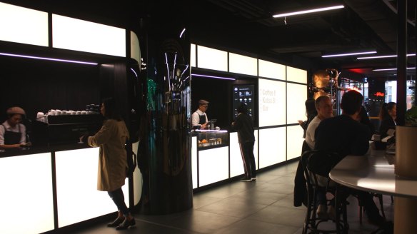 Saint Dreux's lightbox facade and sleek black counter.