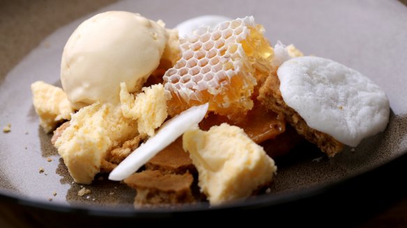 The honeycomb dessert is a cheffy assembly of honey and malt elements.
