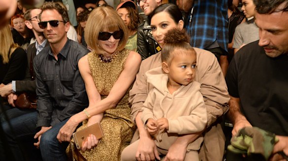  Seth Meyers, Anna Wintour, Kim Kardashian West and North West attend Kanye West Yeezy Season 2 during New York Fashion Week at Skylight Modern on September 16 in New York City.