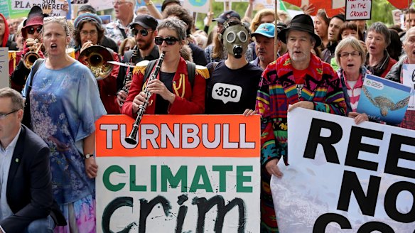 Environmentalists took to Melbourne's streets to protest a potential government loan to coal giant Adani.