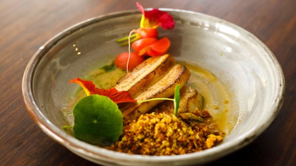 Confit pork jowl with dashi glaze, pickled radishes and nasturtiums at A. Baker.